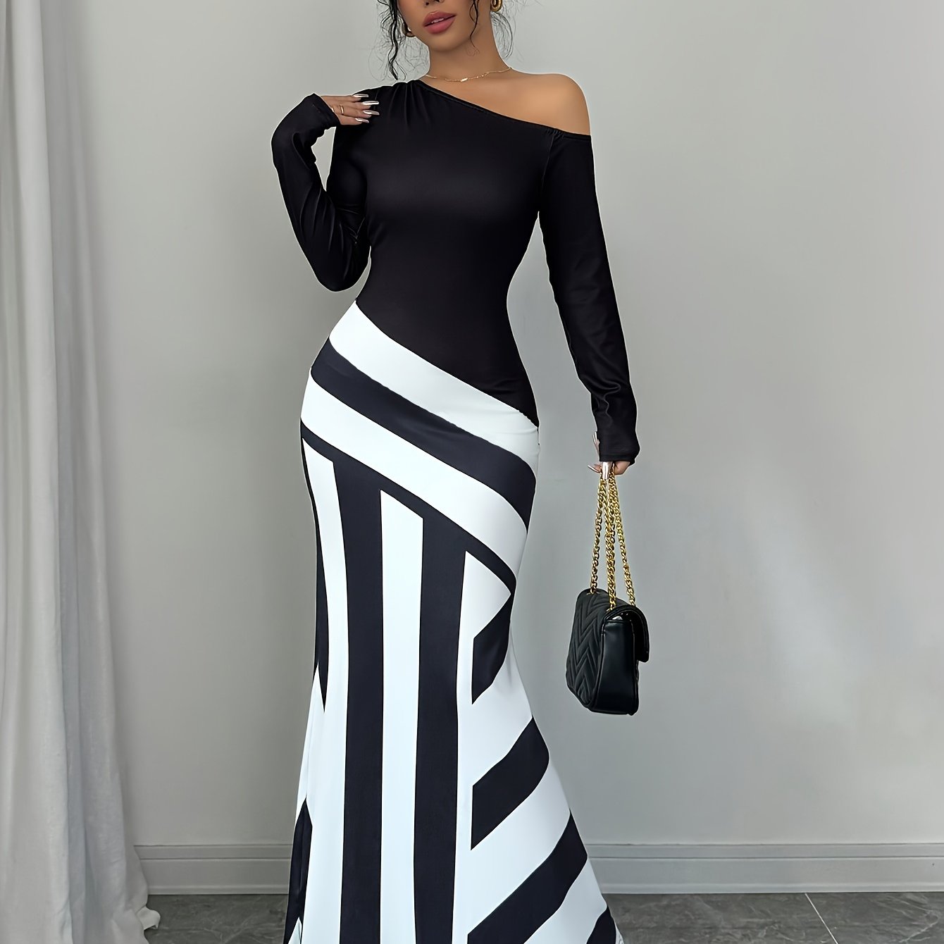 Gaia Off-Shoulder Striped Maxi Dress